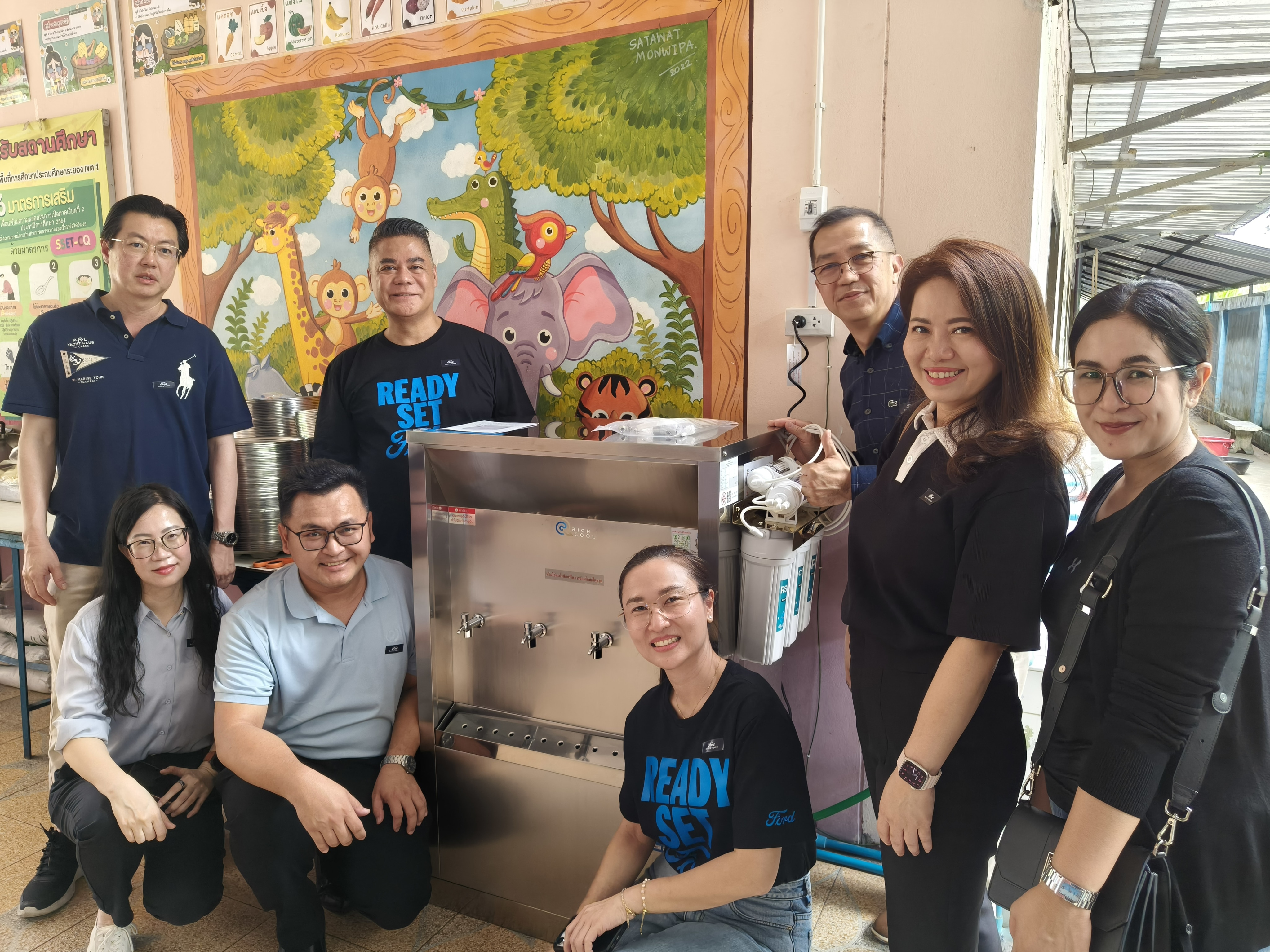 Ford and partner volunteers install equipment as part of the renovation at a childcare center in Bangkok, Thailand, as part of Ford's Global Caring Month, September 2026.